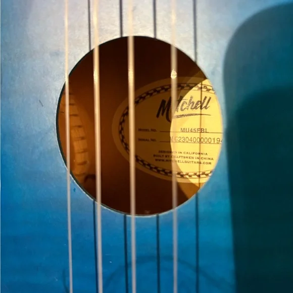 Blue Ukulele with Wooden Fretboard and case - Picture 7 of 13
